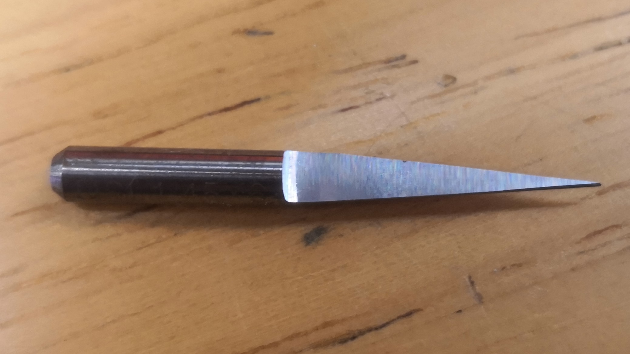 Angled drill bit